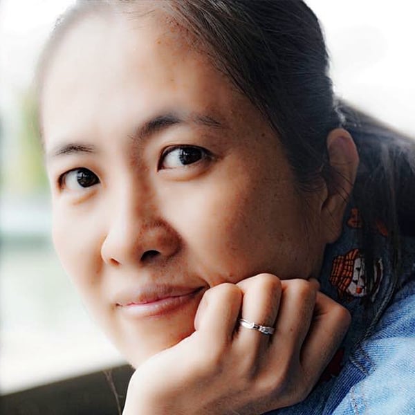 Portrait of a thoughtful Asian woman, one of the Women of Courage.